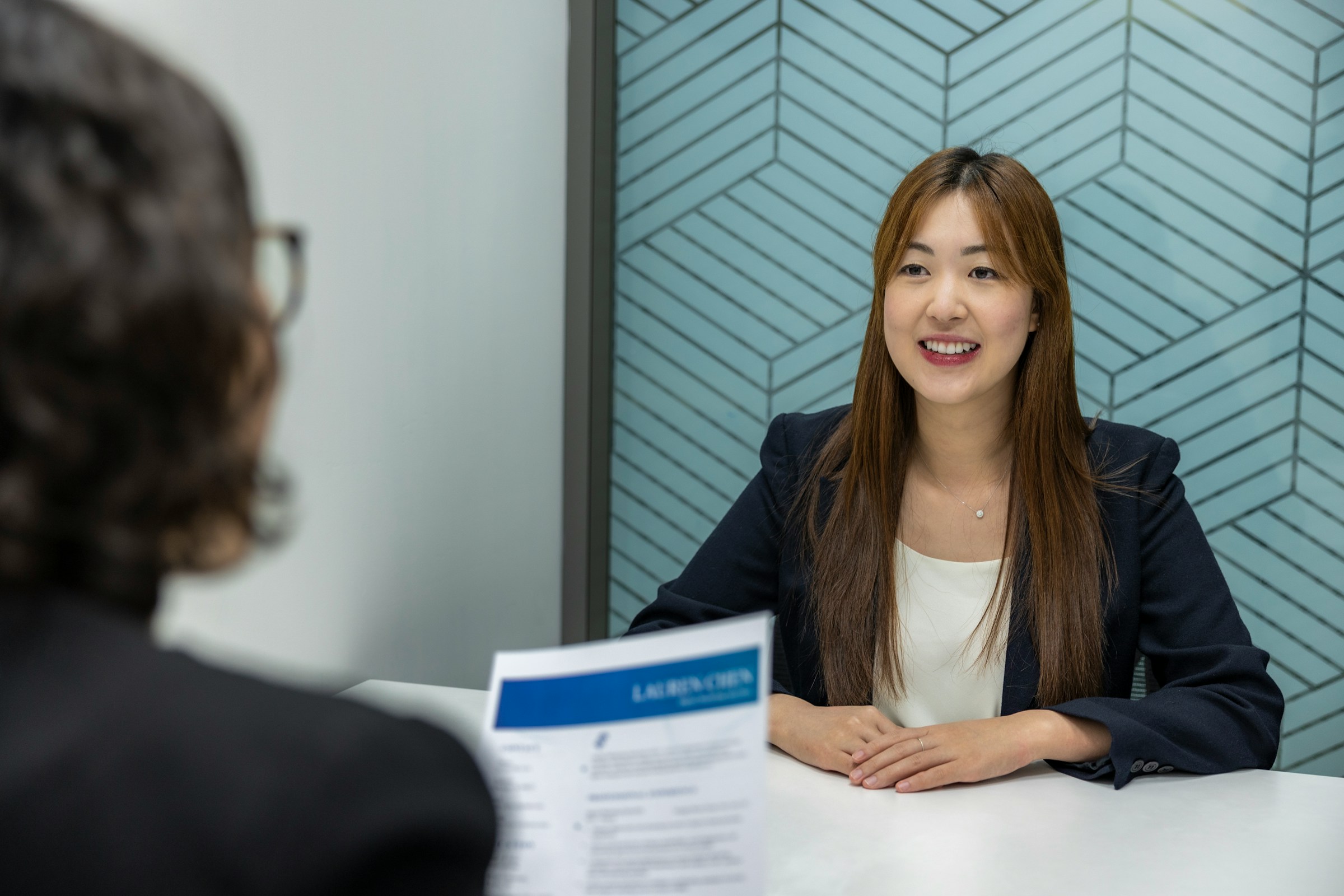 An annual employee review performed by two people in business environment